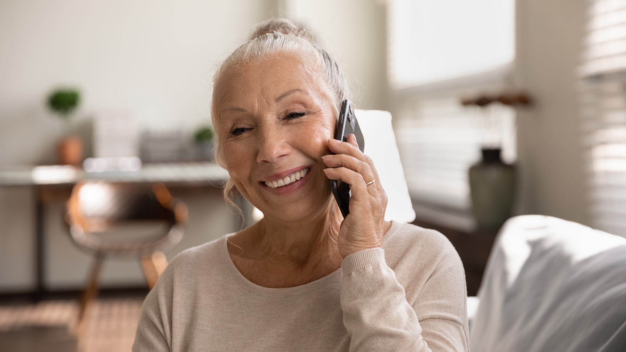 Senior woman talking on a mobile phone.