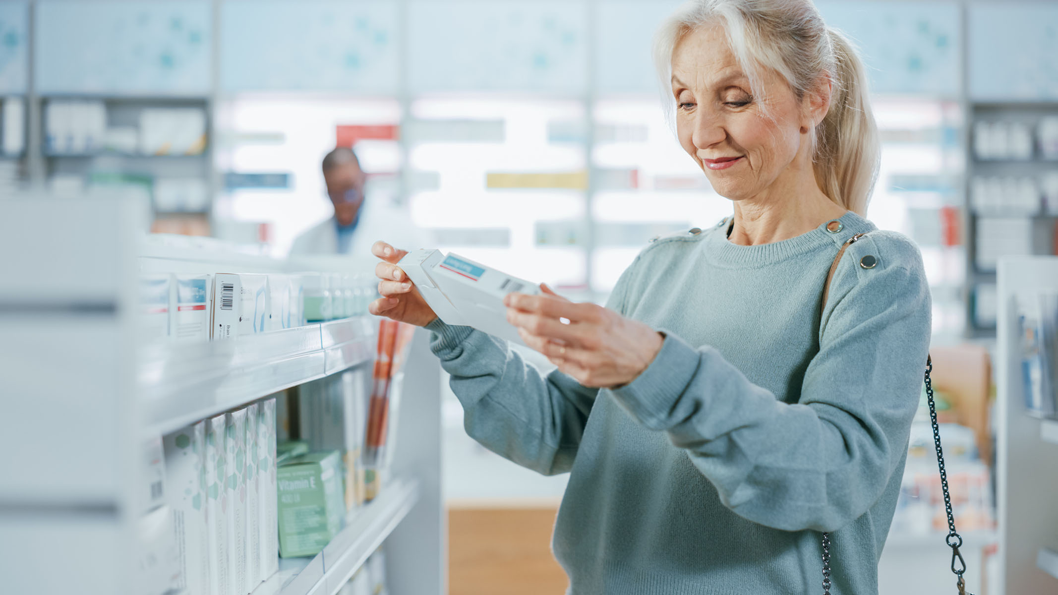 Senior woman shopping at pharmacy.